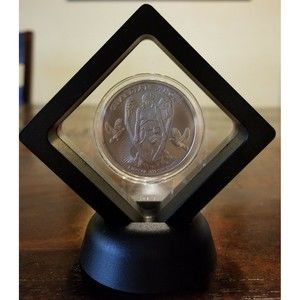 Guardian Angel NIUE 1 dollar 1 oz .999 silver coin.  Framed with display stand.